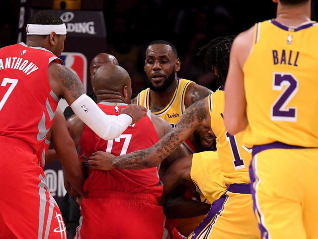 LOS ANGELES, CA - OCTOBER 20: Chris Paul #3 of the Houston Rockets and Rajon Rondo #9 of the Los Angeles Lakers fight during a 124-115 Rockets win at Staples Center on October 20, 2018 in Los Angeles, California.