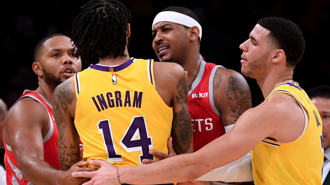LOS ANGELES, CA - OCTOBER 20: Carmelo Anthony #7 and Eric Gordon #10 of the Houston Rockets restrain Brandon Ingram #14 of the Los Angeles Lakers with the help of Lonzo Ball #2 during a 124-115 Rockets win at Staples Center on October 20, 2018 in Los Angeles, California.