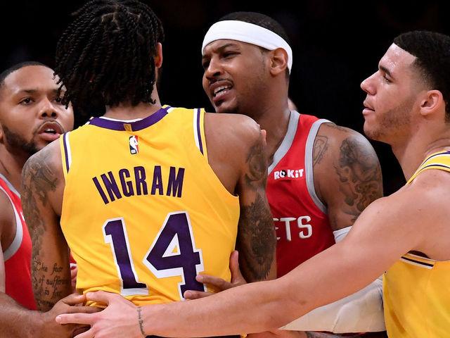 LOS ANGELES, CA - OCTOBER 20: Carmelo Anthony #7 and Eric Gordon #10 of the Houston Rockets restrain Brandon Ingram #14 of the Los Angeles Lakers with the help of Lonzo Ball #2 during a 124-115 Rockets win at Staples Center on October 20, 2018 in Los Angeles, California.
