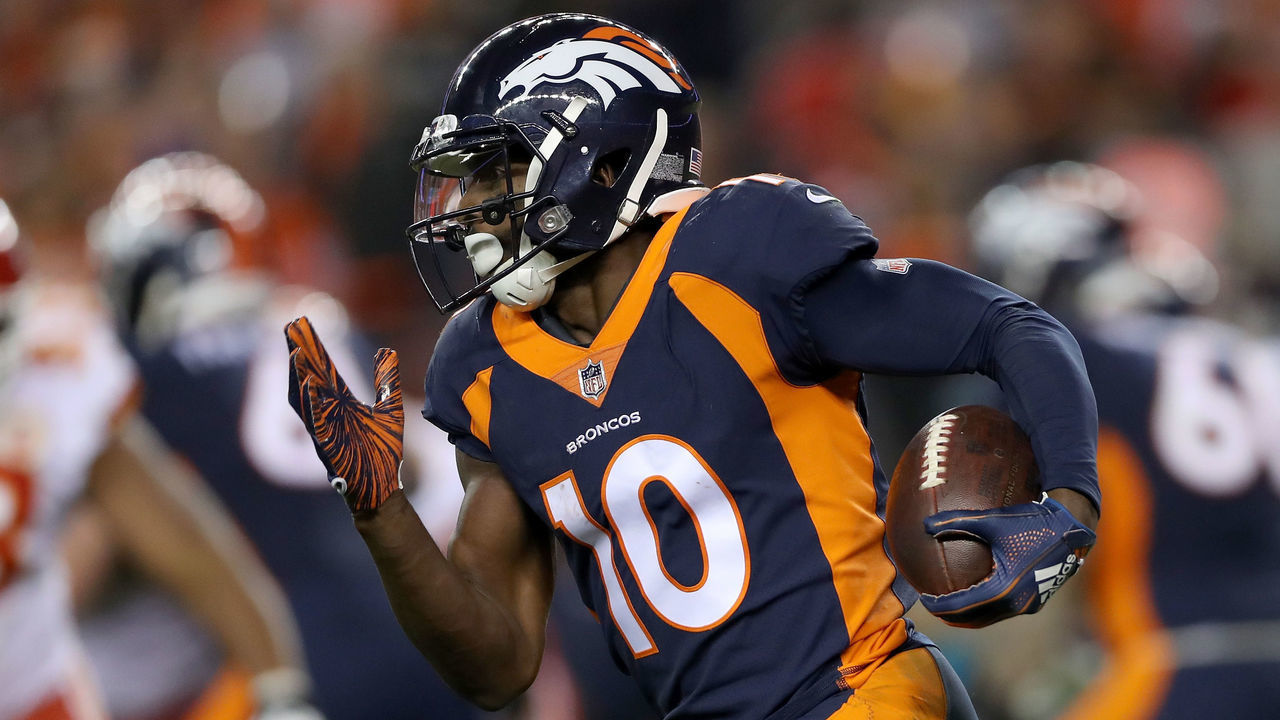 DENVER, CO - OCTOBER 01: Emmanuel Sanders #10 of the Denver Broncos carries the ball after making a reception against the Kansas City Chiefs at Broncos Stadium at Mile High on October 1, 2018 in Denver, Colorado.