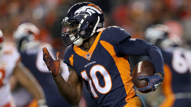 DENVER, CO - OCTOBER 01: Emmanuel Sanders #10 of the Denver Broncos carries the ball after making a reception against the Kansas City Chiefs at Broncos Stadium at Mile High on October 1, 2018 in Denver, Colorado.