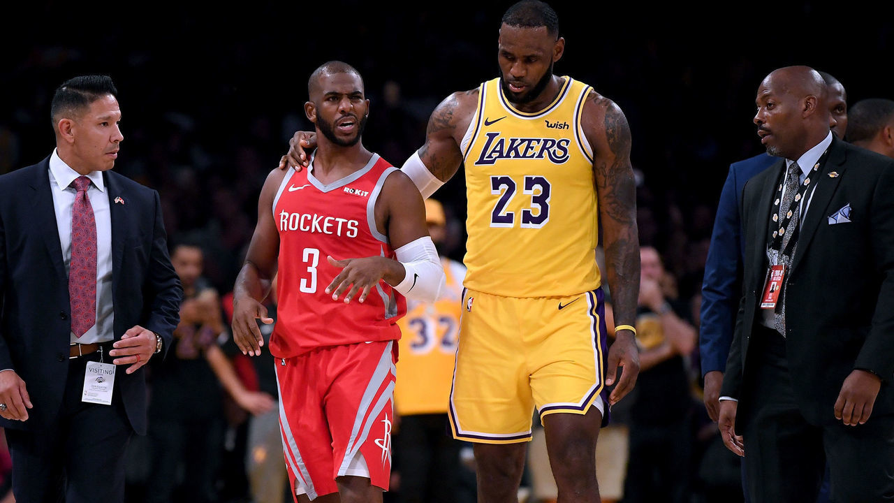 LOS ANGELES, CA - OCTOBER 20: LeBron James #23 of the Los Angeles Lakers escorts Chris Paul #3 of the Houston Rockets after a fight involving Rajon Rondo #9 and Brandon Ingram #14 during a 124-115 Rockets win at Staples Center on October 20, 2018 in Los Angeles, California.