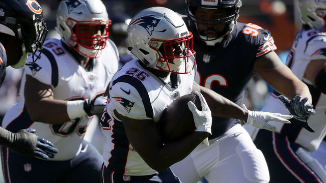 CHICAGO, IL - OCTOBER 21: Sony Michel #26 of the New England Patriots carries the football in the first quarter against the Chicago Bears at Soldier Field on October 21, 2018 in Chicago, Illinois.
