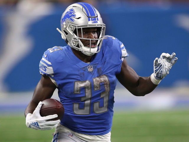 DETROIT, MI - OCTOBER 07: Kerryon Johnson #33 of the Detroit Lions looks for yards after a catch against the Green Bay Packers at Ford Field on October 7, 2018 in Detroit, Michigan.