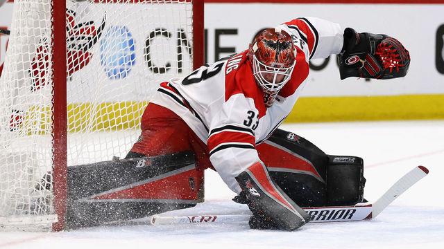 CHICAGO, IL - MARCH 08: Scott Darling #33 of the Carolina Hurricanes makes a save against the Chicago Blackhawks at the United Center on March 8, 2018 in Chicago, Illinois. The Hurricanes defeated the Blackhawks 3-2.
