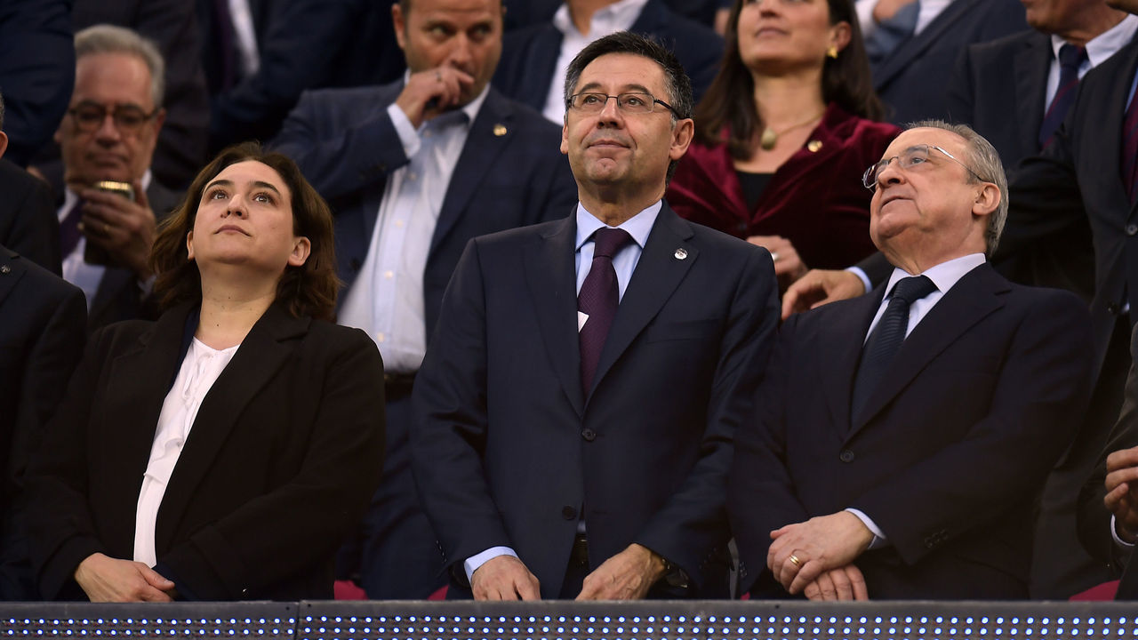 Mayor of Barcelona Ada Colau (L), president of FC Barcelona Josep Maria Bartomeu (C) and president of Real Madrid Florentino Perez attend the Spanish league football match between FC Barcelona and Real Madrid CF at the Camp Nou stadium in Barcelona on May 6, 2018.