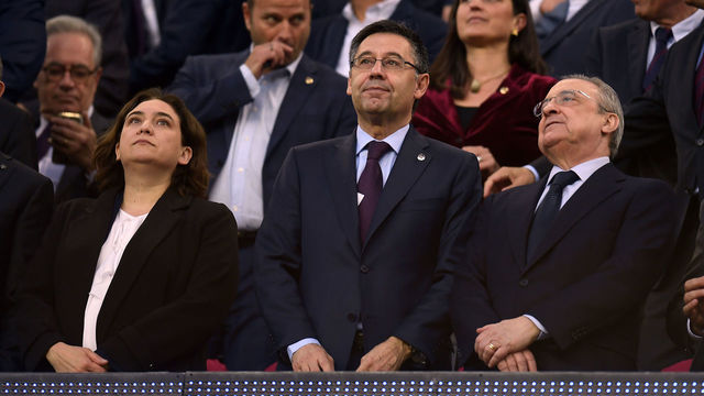 Mayor of Barcelona Ada Colau (L), president of FC Barcelona Josep Maria Bartomeu (C) and president of Real Madrid Florentino Perez attend the Spanish league football match between FC Barcelona and Real Madrid CF at the Camp Nou stadium in Barcelona on May 6, 2018.