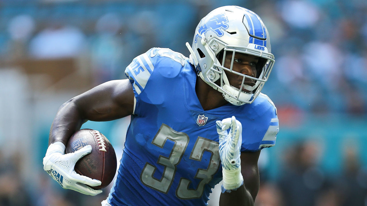 MIAMI, FL - OCTOBER 21: Kerryon Johnson #33 of the Detroit Lions runs with the ball against the Miami Dolphins during the first half at Hard Rock Stadium on October 21, 2018 in Miami, Florida.