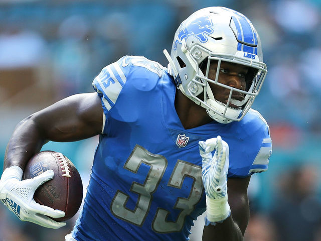 MIAMI, FL - OCTOBER 21: Kerryon Johnson #33 of the Detroit Lions runs with the ball against the Miami Dolphins during the first half at Hard Rock Stadium on October 21, 2018 in Miami, Florida.
