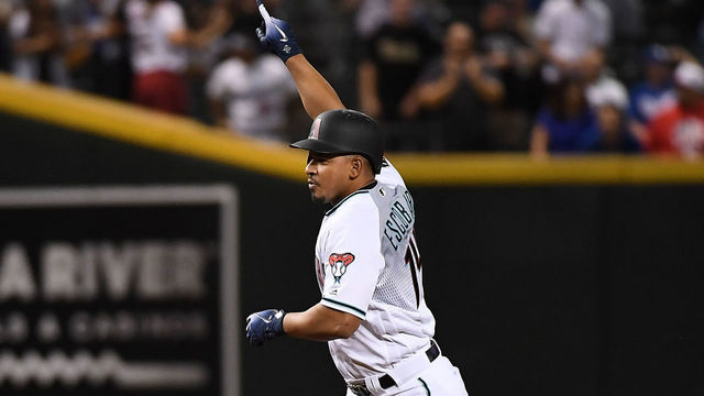 PHOENIX, AZ - SEPTEMBER 25: Eduardo Escobar #14 of the Arizona Diamondback rounds the bases after hitting a game winning home run in the bottom of the ninth inning against the Los Angeles Dodgers at Chase Field on September 25, 2018 in Phoenix, Arizona. Diamondbacks won 4-3.