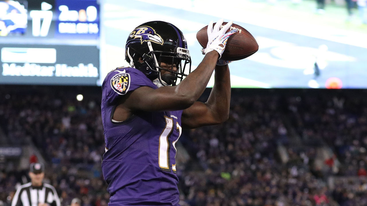 BALTIMORE, MD - OCTOBER 21: Wide Receiver John Brown #13 of the Baltimore Ravens catches a touchdown in the fourth quarter against the New Orleans Saints at M&T Bank Stadium on October 21, 2018 in Baltimore, Maryland.
