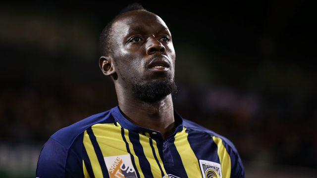 SYDNEY, AUSTRALIA - OCTOBER 12: Usain Bolt of the Mariners walks onto the pitch during the pre-season friendly match between the Central Coast Mariners and Macarthur South West United at Campbelltown Sports Stadium on October 12, 2018 in Sydney, Australia.