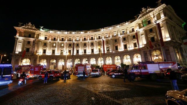 First responders gather on Piazza della Repubblica in central Rome to evacuate wounded persons on October 23, 2018 after around 20 people were injured when an escalator leading to the Repubblica metro station collapsed in an accident believed to have been caused by Russian football fans.
