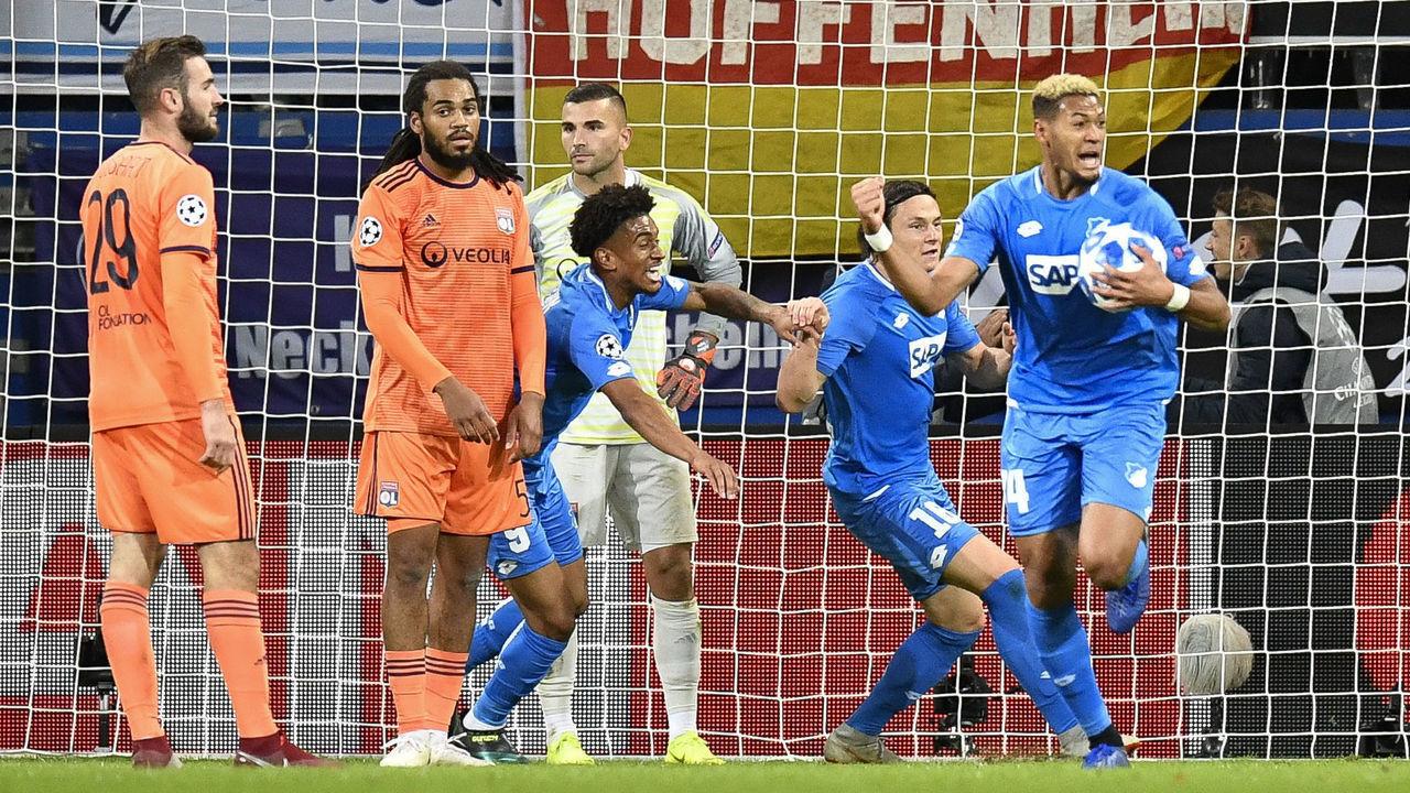 Hoffenheim's Brazilian forward Joelinton (R) celebrates scoring the 3-3 during the UEFA Champions League Group F football match between TSG 1899 Hoffenheim and Olympique Lyon in Sinsheim, on October 23, 2018.