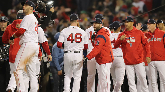 BOSTON, MA - OCTOBER 23: The Boston Red Sox celebrate their 8-4 win over the Los Angeles Dodgers in Game One of the 2018 World Series at Fenway Park on October 23, 2018 in Boston, Massachusetts.