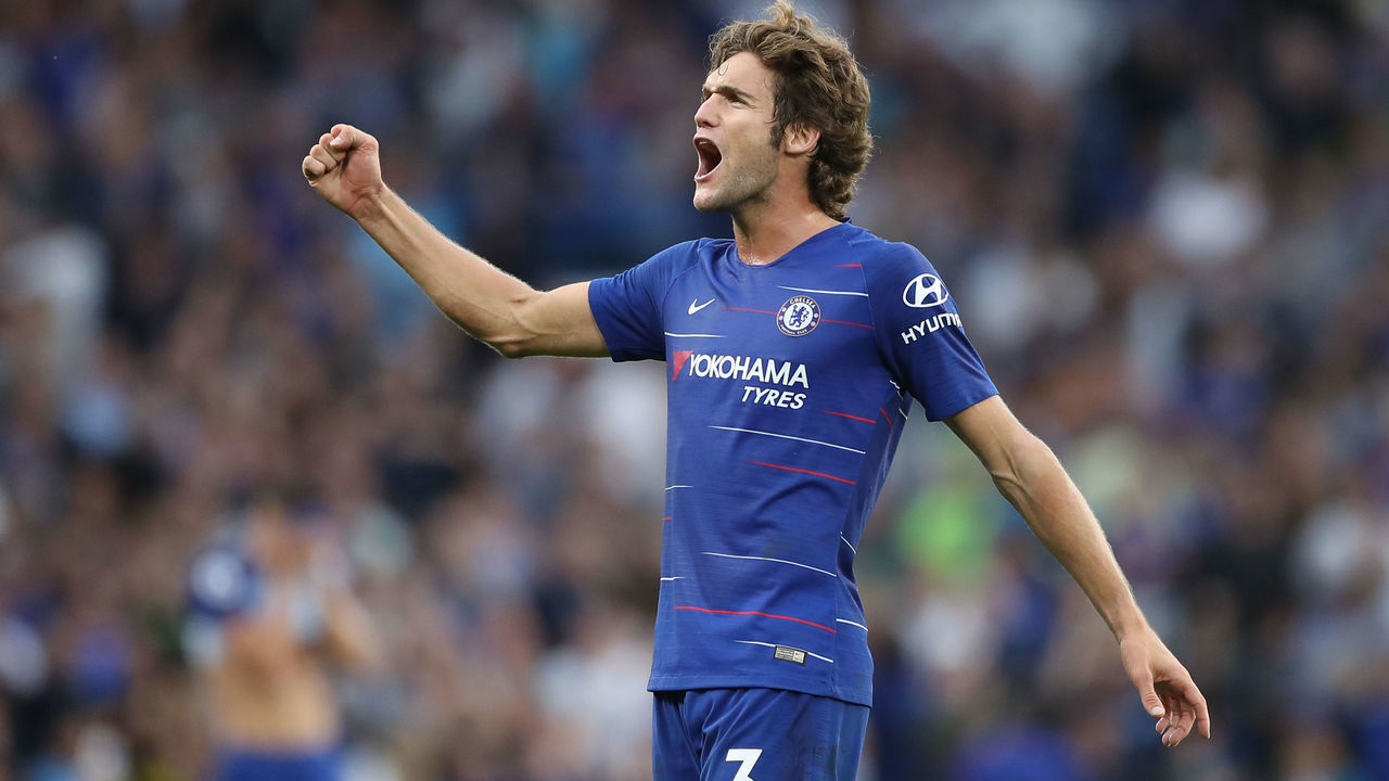 Chelsea's Spanish defender Marcos Alonso celebrates on the final whistle in the English Premier League football match between Chelsea and Arsenal at Stamford Bridge in London on August 18, 2018. - Chelsea won the game 3-2.