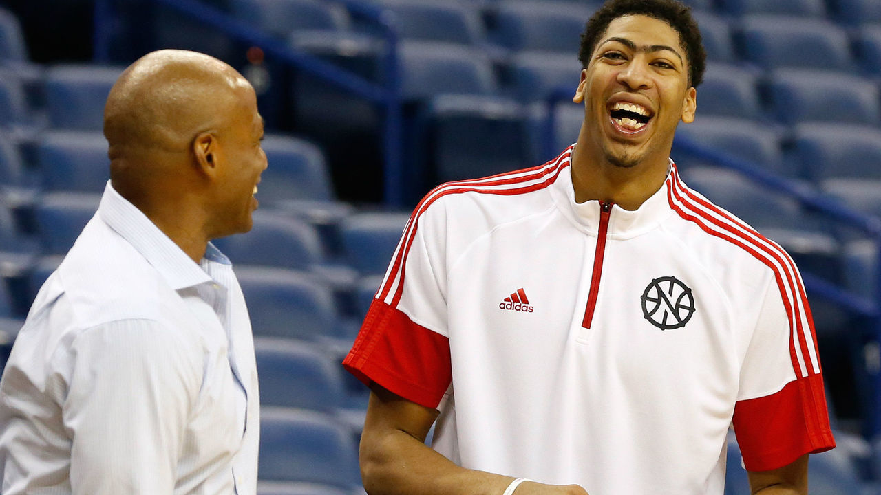 NEW ORLEANS, LA - OCTOBER 16: Head coach Monty Williams (L) and General Manager Dell Demps (R) of the New Orleans Pelicans share a laugh with Anthony Davis (C) during an open practice for fans on October 25, 2014 at the Smoothie King Center in New Orleans, Louisiana. Mandatory Copyright Notice: Copyright 2014 NBAE (Photo by Layne Murdoch/NBAE via Getty Images
