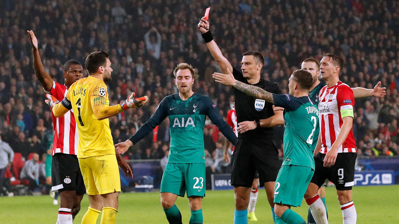 EINDHOVEN, NETHERLANDS - OCTOBER 24: Hugo Lloris of Tottenham Hotspur receives a red card from referee Slavko Vincic during the UEFA Champions League match between PSV v Tottenham Hotspur at the Philips Stadium on October 24, 2018 in Eindhoven Netherlands