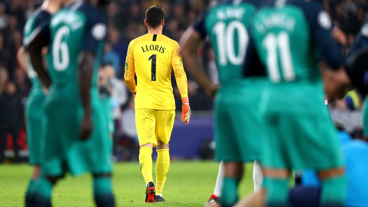 EINDHOVEN, NETHERLANDS - OCTOBER 24: Hugo Lloris of Tottenham Hotspur walks off the pitch after receiving a red card from referee Slavko Vincic during the Group B match of the UEFA Champions League between PSV and Tottenham Hotspur at Philips Stadion on October 24, 2018 in Eindhoven, Netherlands.
