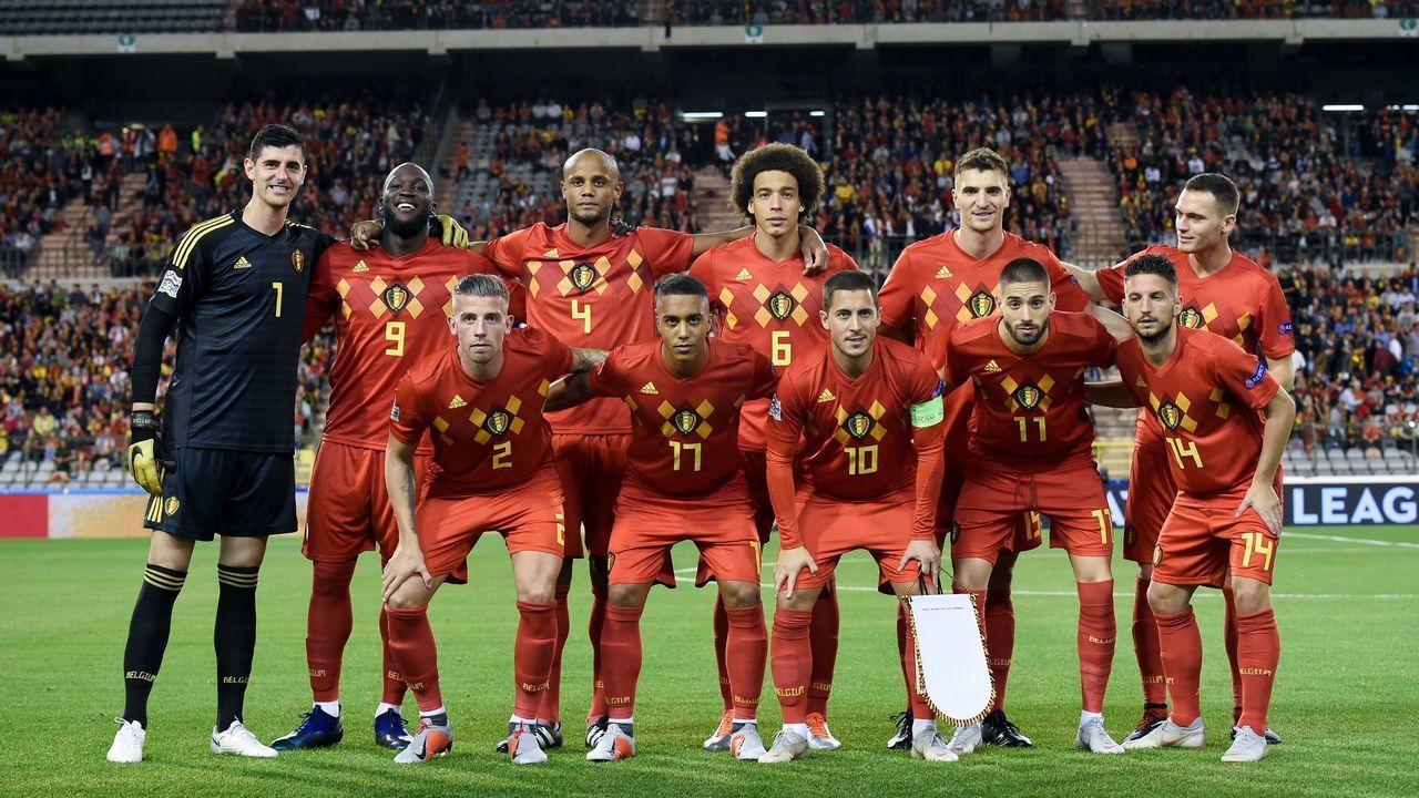Belgium's team players (back row from L to R) goalkeeper Thibaut Courtois, forward Romelu Lukaku, defender Vincent Kompany, midfielder Axel Witsel, defender Thomas Meunier, midfielder Thomas Vermaelen (front row from L to R) defender Toby Alderweireld, midfielder Youri Tielemans, midfielder Eden Hazard, midfielder Yannick Carrasco, forward Dries Mertens pose for a team picture prior to the UEFA Nations League football match between Belgium and Switzerland, at the King Baudouin Stadium, in Brussels, on October 12, 2018.