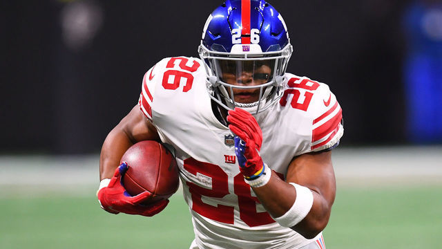 ATLANTA, GA - OCTOBER 22: Saquon Barkley #26 of the New York Giants runs the ball during the second quarter against the New York Giants at Mercedes-Benz Stadium on October 22, 2018 in Atlanta, Georgia.