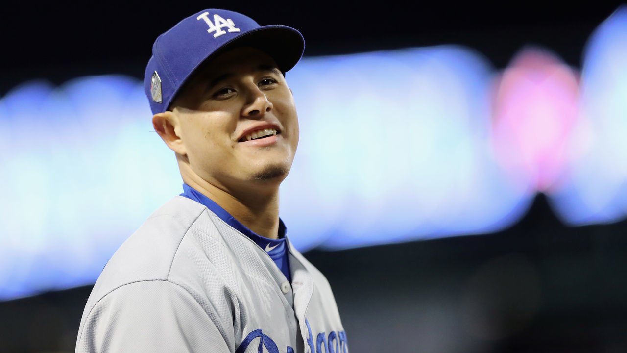 BOSTON, MA - OCTOBER 24: Manny Machado #8 of the Los Angeles Dodgers reacts after recording an out during the third inning against the Boston Red Sox in Game Two of the 2018 World Series at Fenway Park on October 24, 2018 in Boston, Massachusetts.