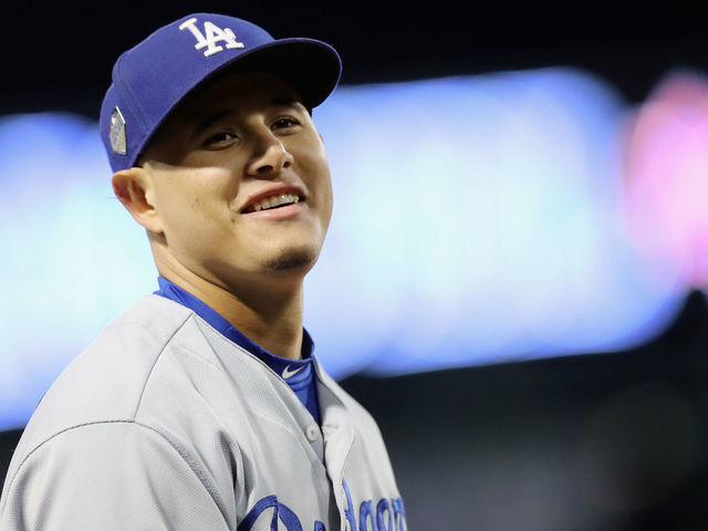 BOSTON, MA - OCTOBER 24: Manny Machado #8 of the Los Angeles Dodgers reacts after recording an out during the third inning against the Boston Red Sox in Game Two of the 2018 World Series at Fenway Park on October 24, 2018 in Boston, Massachusetts.