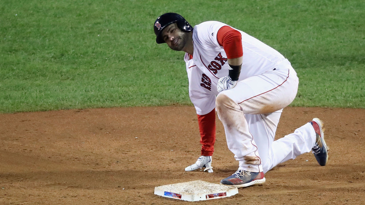 BOSTON, MA - OCTOBER 23: J.D. Martinez #28 of the Boston Red Sox is safe at second base after hitting a third inning double against the Los Angeles Dodgers in Game One of the 2018 World Series at Fenway Park on October 23, 2018 in Boston, Massachusetts.