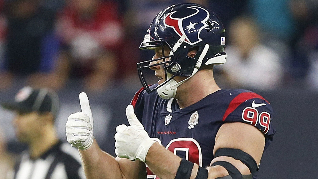 HOUSTON, TX - OCTOBER 25: J.J. Watt #99 of the Houston Texans celebrates a sack of Brock Osweiler #8 of the Miami Dolphins in the first quarter at NRG Stadium on October 25, 2018 in Houston, Texas.