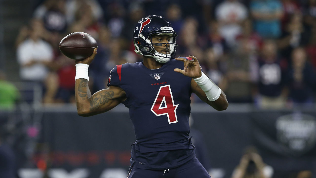 HOUSTON, TX - OCTOBER 25: Deshaun Watson #4 of the Houston Texans sets up to pass against the Miami Dolphins in the first quarter at NRG Stadium on October 25, 2018 in Houston, Texas.