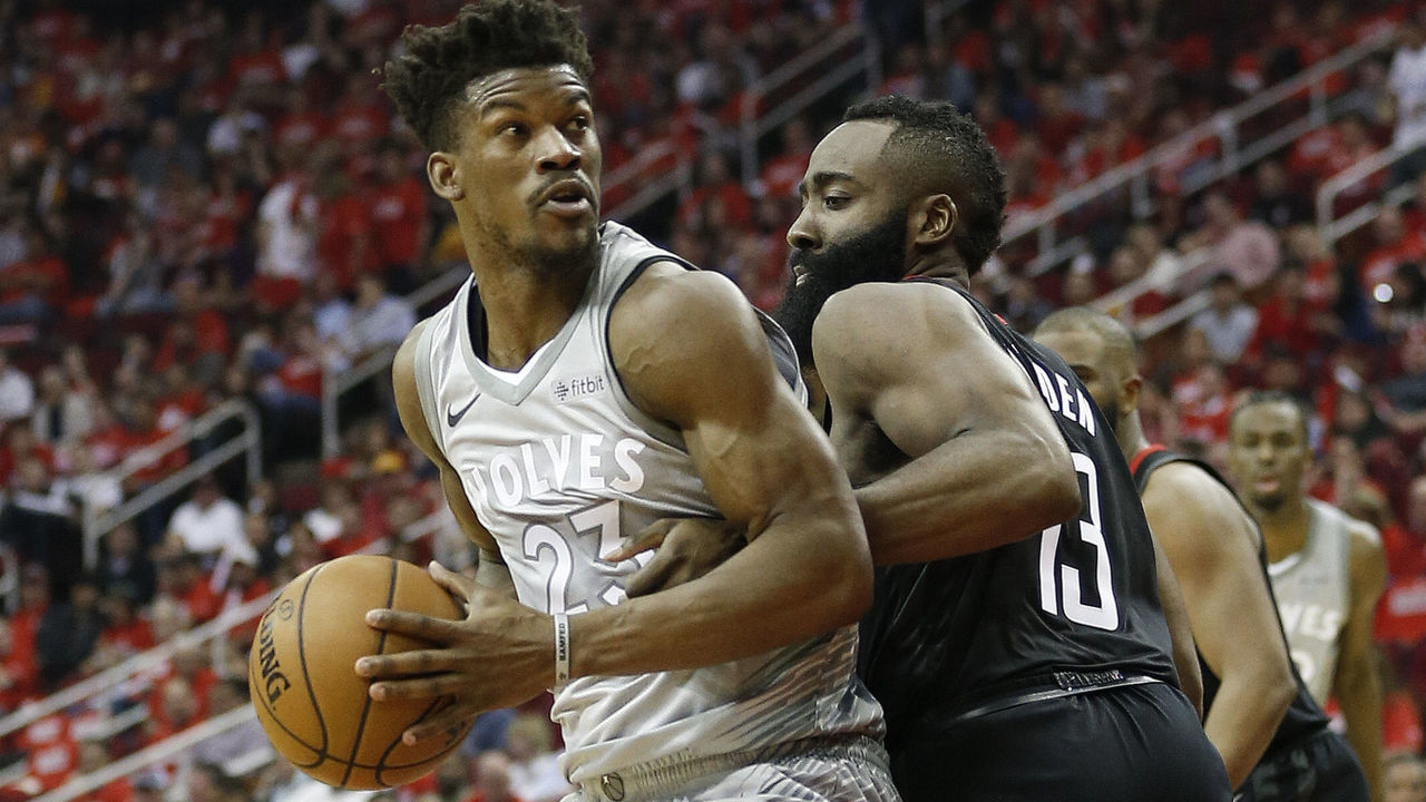 HOUSTON, TX - APRIL 18: Jimmy Butler #23 of the Minnesota Timberwolves backs in on James Harden #13 of the Houston Rockets in the third quarter during Game Two of the first round of the Western Conference playoffs at Toyota Center on April 18, 2018 in Houston, Texas.