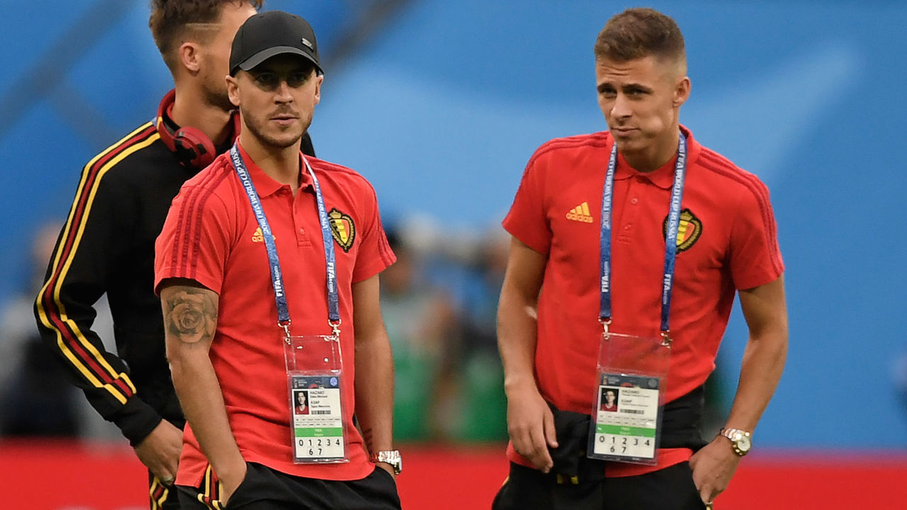Belgium's forward Thorgan Hazard (R) and Belgium's forward Eden Hazard (L) inspect the pitch ahead of the Russia 2018 World Cup semi-final football match between France and Belgium at the Saint Petersburg Stadium in Saint Petersburg on July 10, 2018.