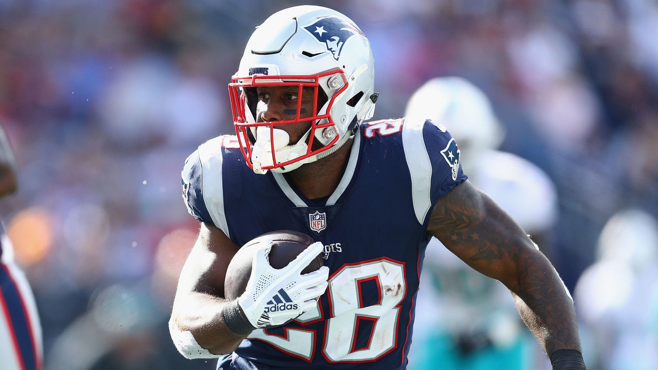 FOXBOROUGH, MA - SEPTEMBER 30: James White #28 of the New England Patriots runs with the ball during the second half against the Miami Dolphins at Gillette Stadium on September 30, 2018 in Foxborough, Massachusetts.