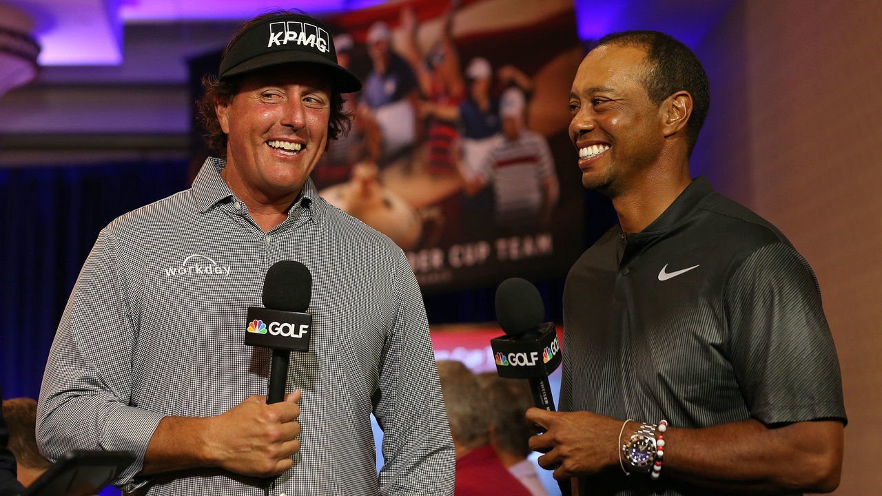 WEST CONSHOHOCKEN, PA - SEPTEMBER 04: Phil Mickelson and Tiger Woods are interviewed by the Golf Channel after being named as Captain's Picks along with Bryson DeChambeau by U.S. Ryder Cup Captain for the 2018 U.S. team during a press conference at the Philadelphia Marriott West on September 4, 2018 in West Conshohocken, Pennsylvania.