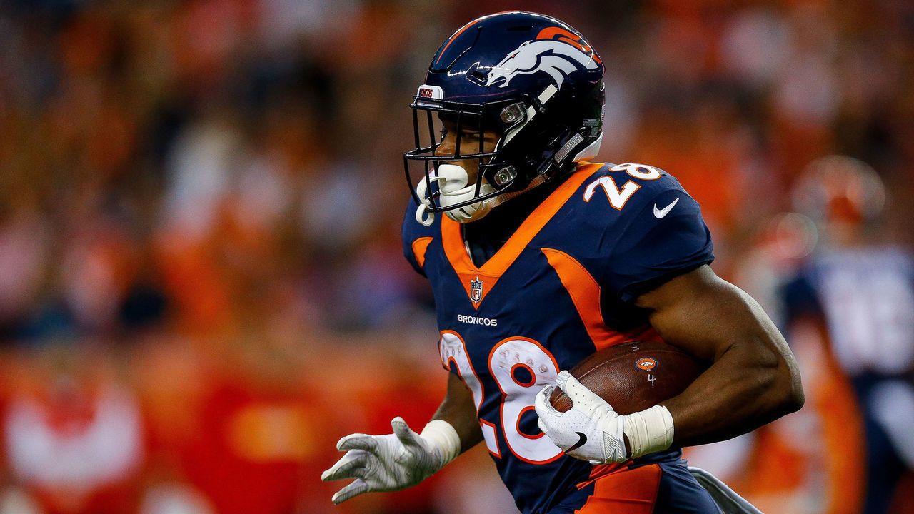 DENVER, CO - OCTOBER 1: Running back Royce Freeman #28 of the Denver Broncos carries the ball against the Kansas City Chiefs at Broncos Stadium at Mile High on October 1, 2018 in Denver, Colorado.