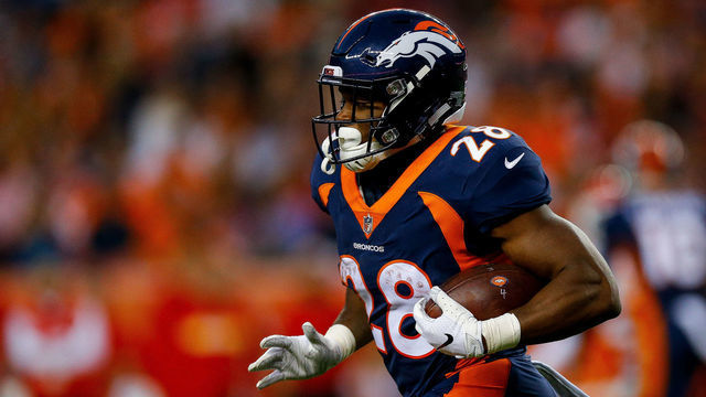DENVER, CO - OCTOBER 1: Running back Royce Freeman #28 of the Denver Broncos carries the ball against the Kansas City Chiefs at Broncos Stadium at Mile High on October 1, 2018 in Denver, Colorado.