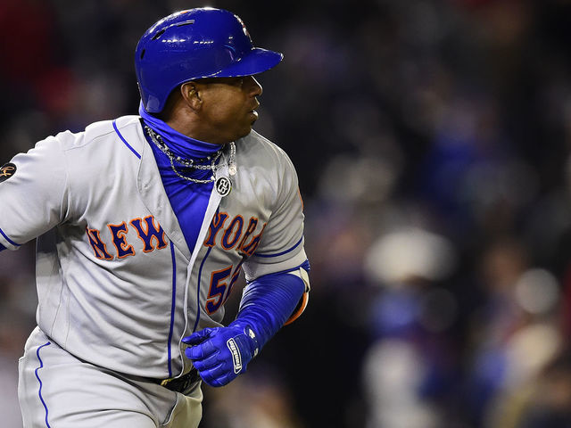 WASHINGTON, DC - APRIL 08: Yoenis Cespedes #52 of the New York Mets hits an RBI single scoring Juan Lagares #12 (not pictured) in the twelfth inning against the Washington Nationals at Nationals Park on April 8, 2018 in Washington, DC. The Mets defeated the Nationals 6-5.