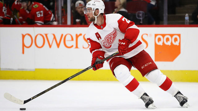 CHICAGO, IL - SEPTEMBER 21: Mike Green #25 of the Detroit Red Wings advances the puck against the Chicago Blackhawks during a preseason game at the United Center on September 21, 2017 in Chicago, Illinois. The Blackhawks defeated the Red Wings 6-1.