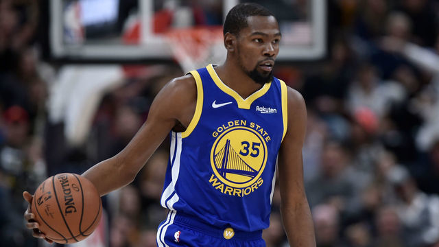 SALT LAKE CITY, UT - OCTOBER 19: Kevin Durant #35 of the Golden State Warriors brings the ball up court against the Utah Jazz in a NBA game at Vivint Smart Home Arena on October 19, 2018 in Salt Lake City, Utah.