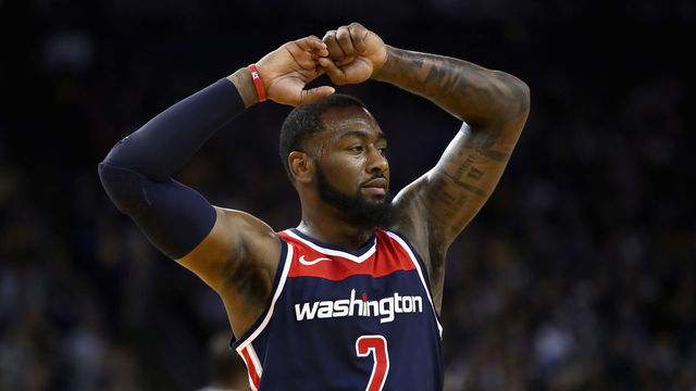 OAKLAND, CA - OCTOBER 24: John Wall #2 of the Washington Wizards puts his hands on his head after the Golden State Warriors scored a basket at ORACLE Arena on October 24, 2018 in Oakland, California.