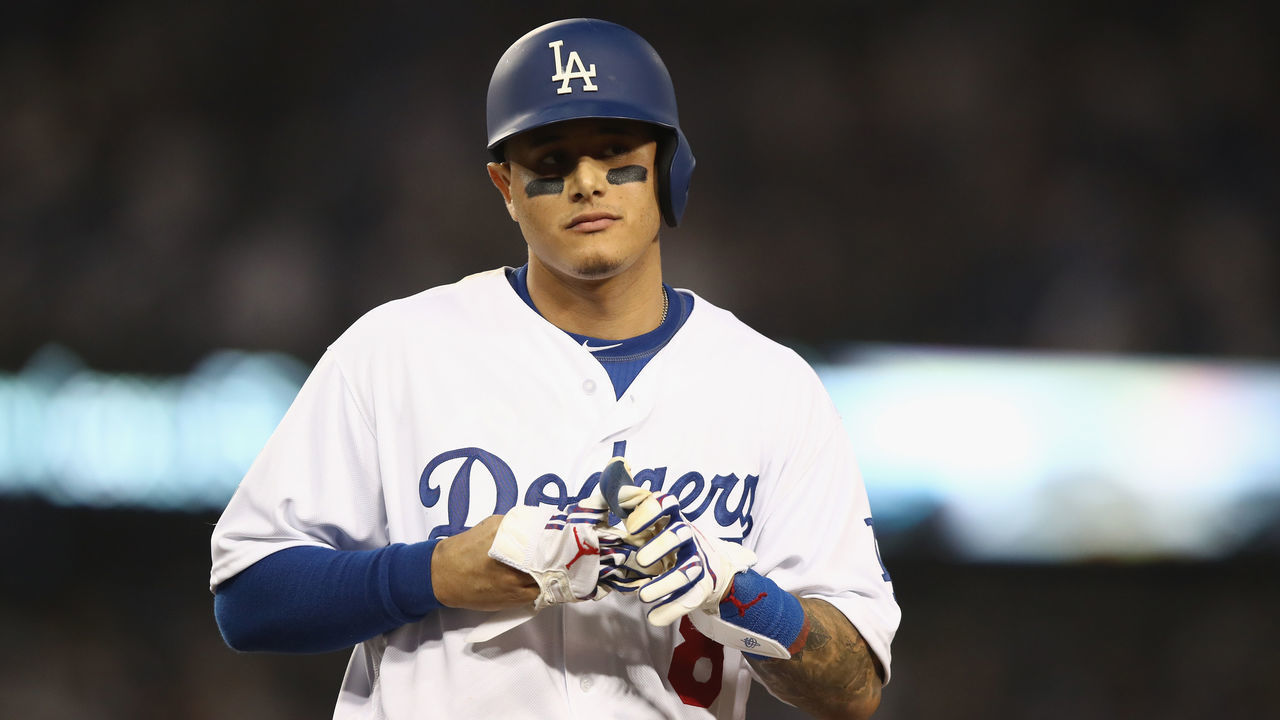LOS ANGELES, CA - OCTOBER 26: Manny Machado #8 of the Los Angeles Dodgers reacts after flying out during the tenth inning against the Boston Red Sox in Game Three of the 2018 World Series at Dodger Stadium on October 26, 2018 in Los Angeles, California.