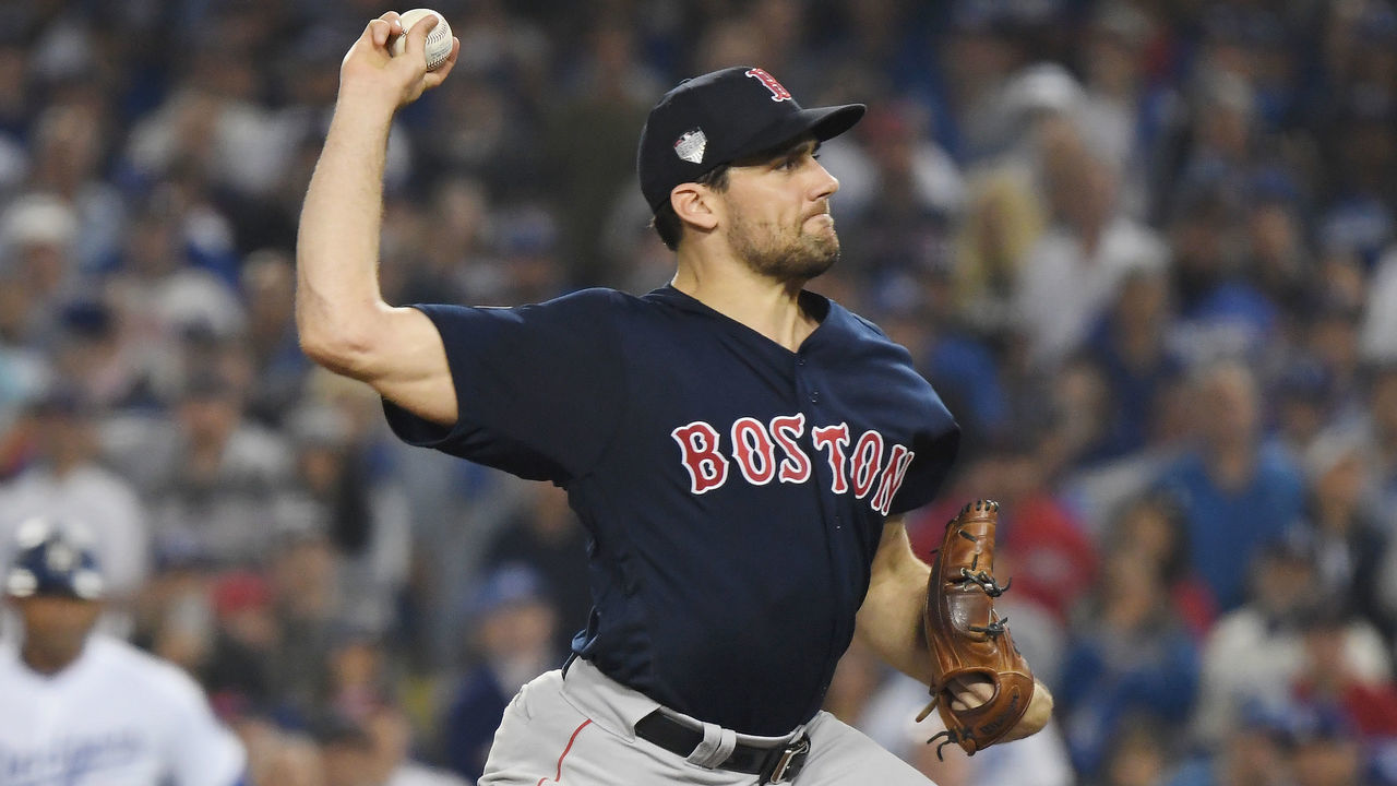 LOS ANGELES, CA - OCTOBER 26: Nathan Eovaldi #17 of the Boston Red Sox delivers the pitch during the twelfth inning against the Los Angeles Dodgers in Game Three of the 2018 World Series at Dodger Stadium on October 26, 2018 in Los Angeles, California.