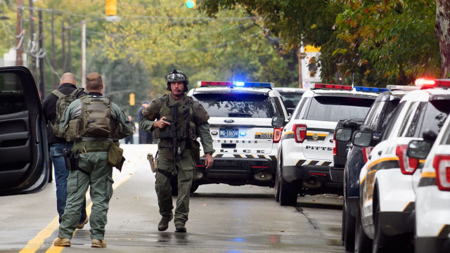 PITTSBURGH, PA - OCTOBER 27: Police rapid response team members respond to the site of a mass shooting at the Tree of Life Synagogue in the Squirrel Hill neighborhood on October 27, 2018 in Pittsburgh, Pennsylvania. According to reports, at least 12 people were shot, 4 dead and three police officers hurt during the incident. The shooter surrendered to authorities and was taken into custody.
