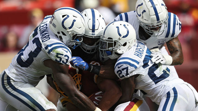 LANDOVER, MD - SEPTEMBER 16: Tight end Jordan Reed #86 of the Washington Redskins is tackled by linebacker Darius Leonard #53 of the Indianapolis Colts and teammates during the fourth quarter at FedExField on September 16, 2018 in Landover, Maryland.