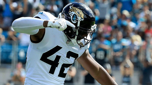 JACKSONVILLE, FL - SEPTEMBER 30: Barry Church #42 of the Jacksonville Jaguars celebrates a defensive stop during the game against the New York Jets on September 30, 2018 in Jacksonville, Florida.