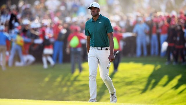 Tony Finau of the US arrives at the 18th hole during the WGC-HSBC Champions golf tournament in Shanghai on October 28, 2018.
