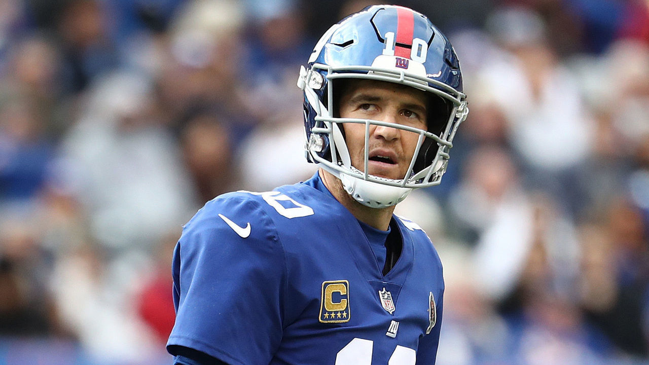 EAST RUTHERFORD, NJ - OCTOBER 28: Eli Manning #10 of the New York Giants walks off the field after failing to convert a first down in the fourth quarter against the Washington Redskins during their game at MetLife Stadium on October 28, 2018 in East Rutherford, New Jersey.