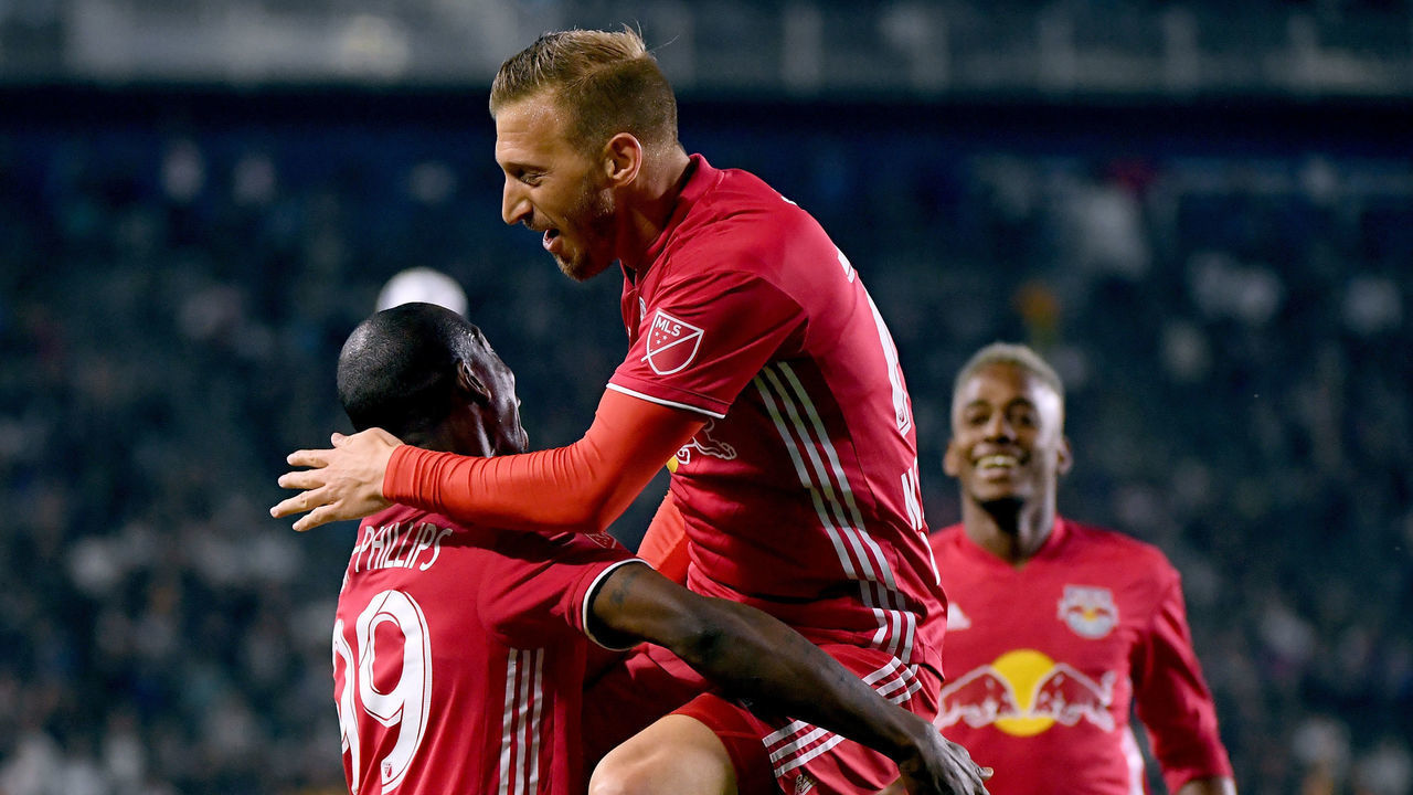 CARSON, CA - APRIL 28: Daniel Royer #77 of New York Red Bulls celebrates his goal with Bradley Wright-Phillips #99 and Michael Murillo #62 to take a 1-0 lead over the Los Angeles Galaxy during the first half at StubHub Center on April 28, 2018 in Carson, California.