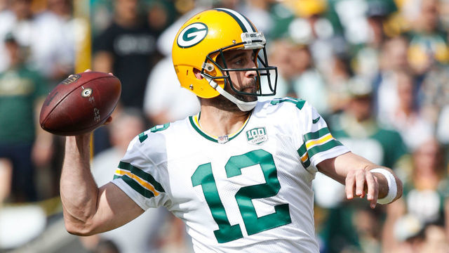 LOS ANGELES, CA - OCTOBER 28: Quarterback Aaron Rodgers #12 of the Green Bay Packers looks to make a pass in the first quarter against the Los Angeles Rams at Los Angeles Memorial Coliseum on October 28, 2018 in Los Angeles, California.