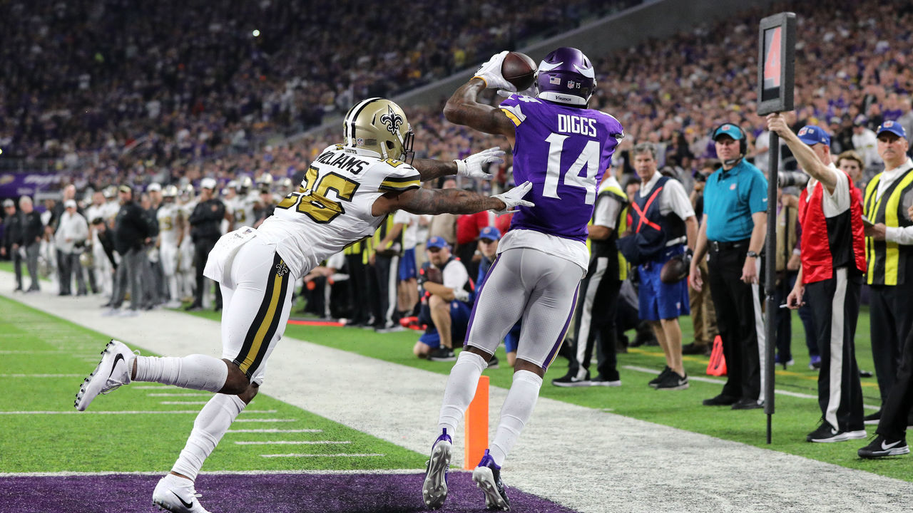 MINNEAPOLIS, MN - OCTOBER 28: Stefon Diggs #14 of the Minnesota Vikings catches the ball for a touchdown in the first quarter of the game against the New Orleans Saints at U.S. Bank Stadium on October 28, 2018 in Minneapolis, Minnesota.